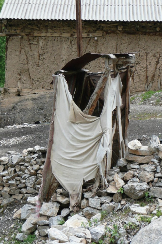 This toilet 'hellhole' in Tajikistan sees visitors using the fabric that shrouds it as loo roll