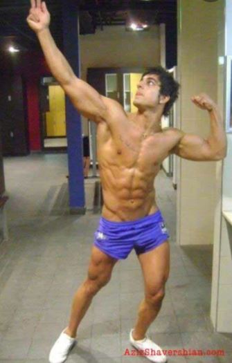 The late bodybuilder Aziz Shavershian doing his famous pose