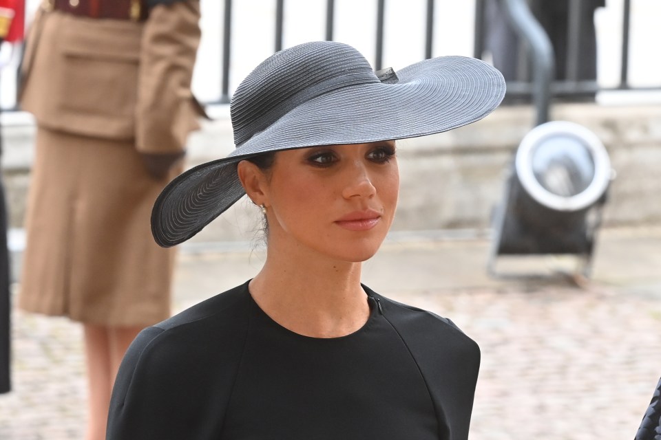 Meghan Markle arrives at the service, accompanied by Prince Harry