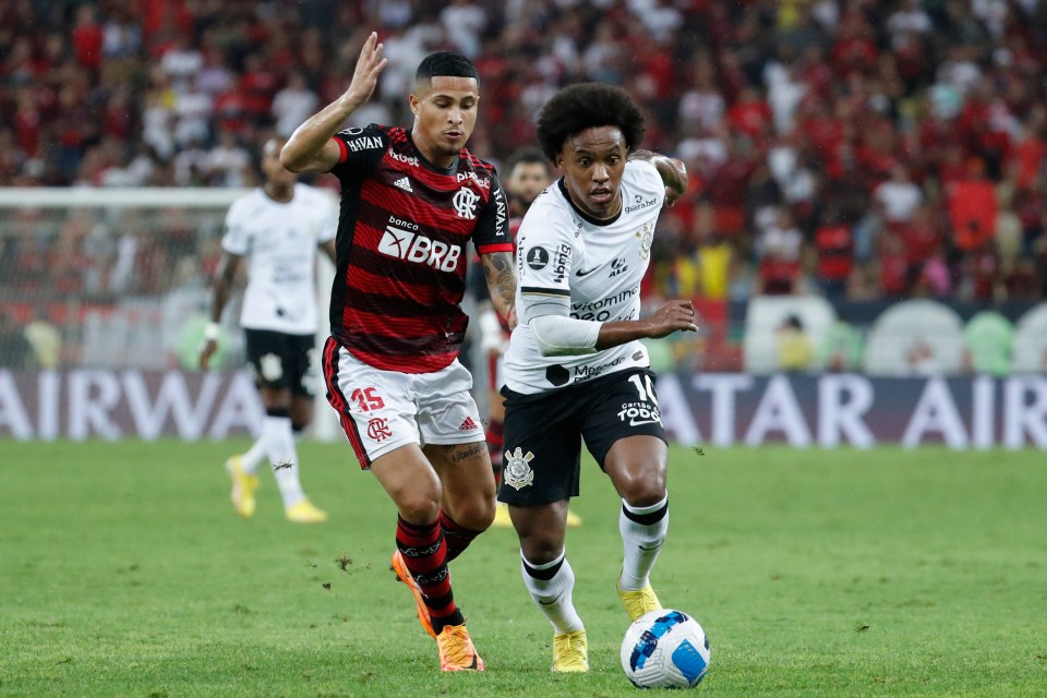 Gomes battles for the ball with now Fulham star Willian