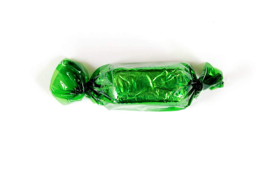 The Milk Chocolate Block is one of two green chocolates in a Quality Street tub