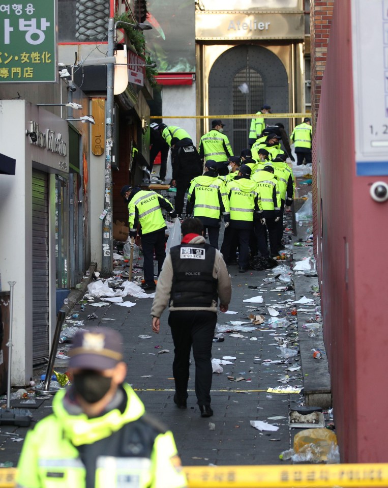 Police searching the scene near the Hamilton Hotel