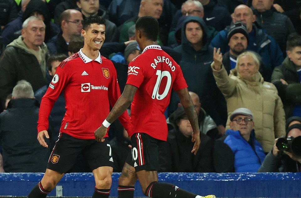 Cristiano Ronaldo grins with joy after his landmark strike put Man Utd 2-1 up at the end of the first half at Goodison Park