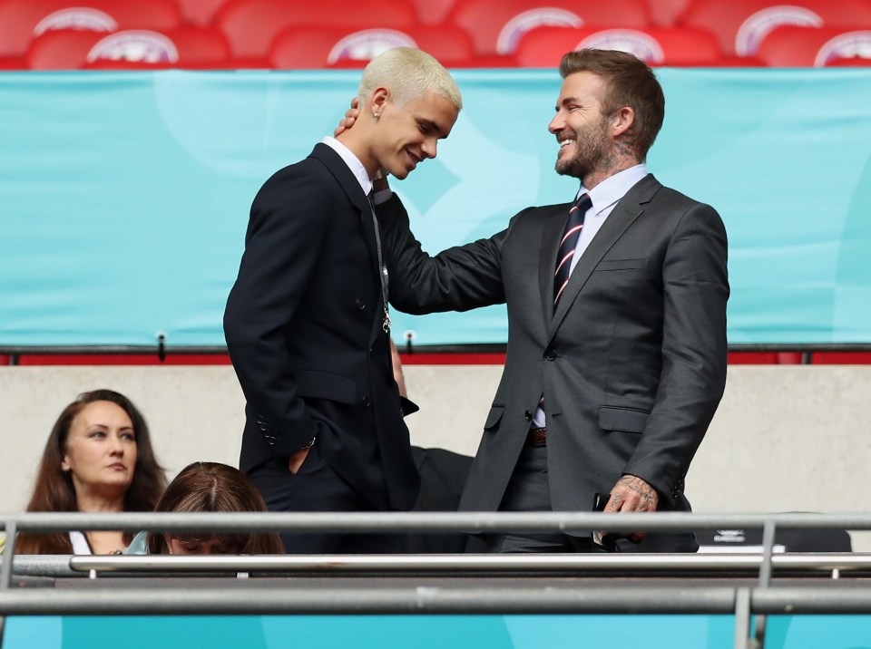 Romeo Beckham with his dad David