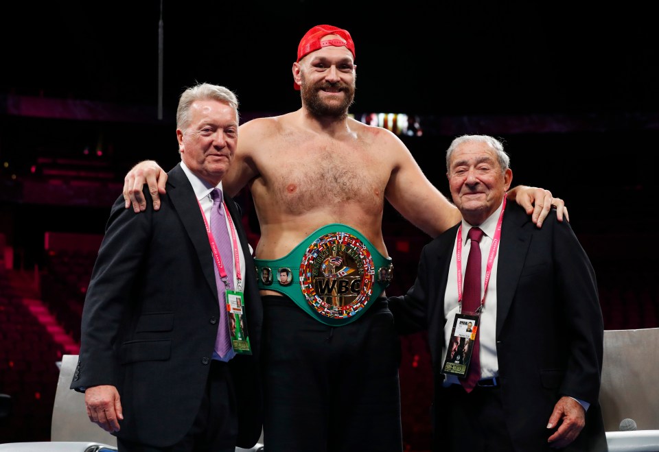 Fury (middle) with US promoter Arum (right) and UK promoter Frank Warren (left)