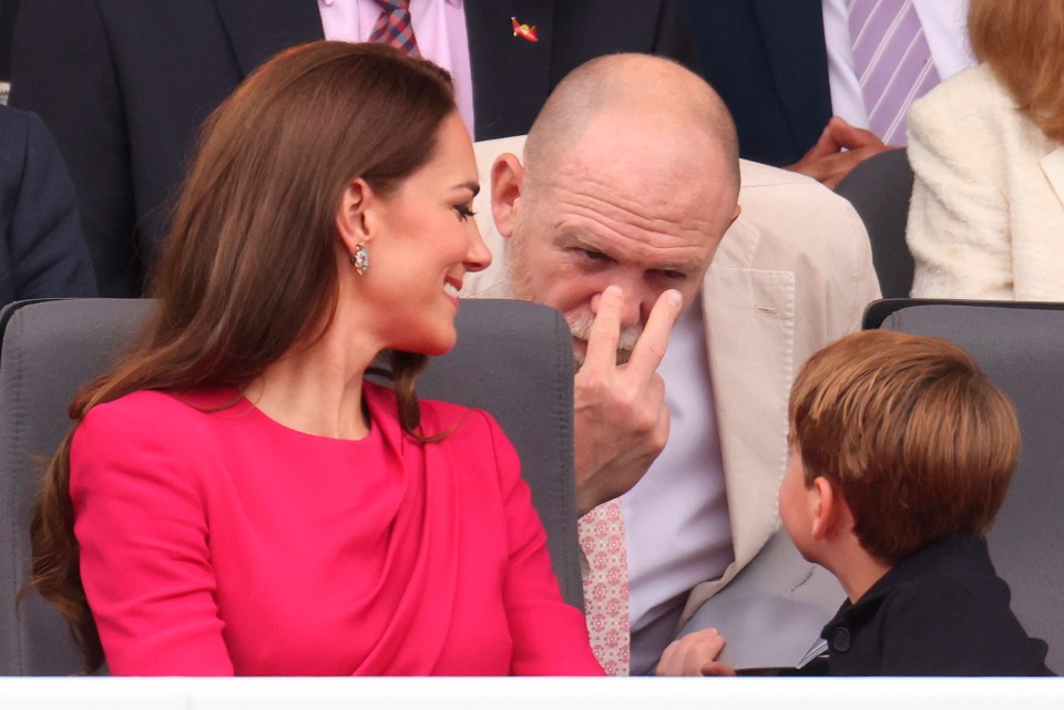 Mike Tindall gestures towards Prince Louis during the Platinum Jubilee Pageant outside Buckingham Palace in London