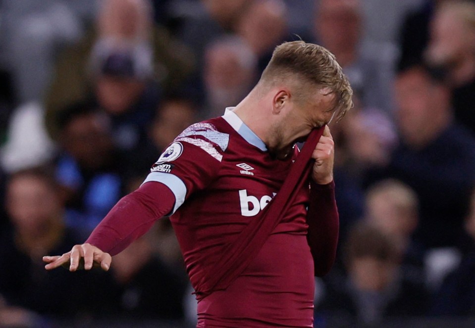 The West Ham star grimaced in pain