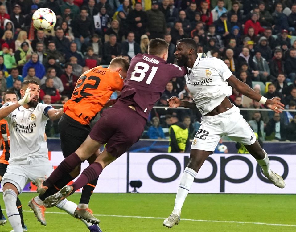 The moment Rudiger equalised for Real Madrid before getting knocked flying by the Shakhtar Donestk goalkeeper