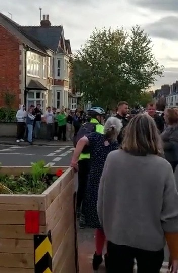 Crowds of neighbours lined the road to join the protest