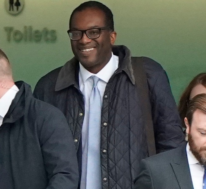 Kwasi Kwarteng arrives back in London