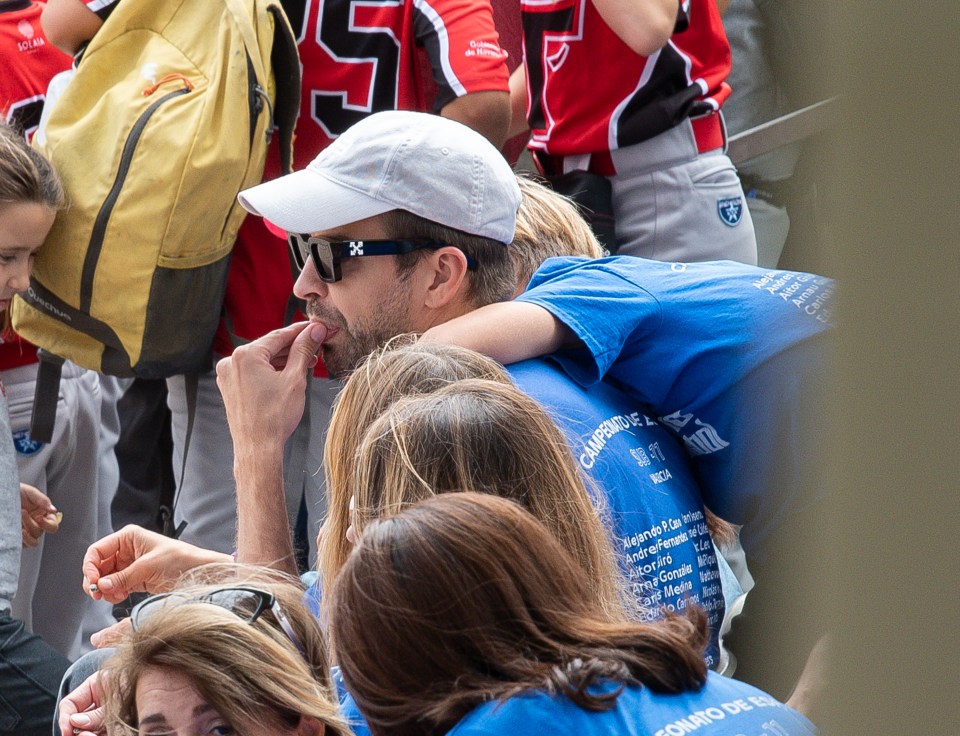 Gerard Pique tried to go under the radar in a cap and sunglasses