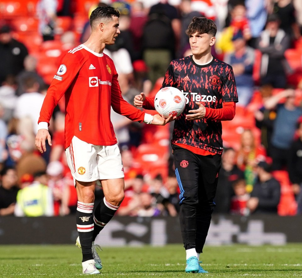 Ronaldo handing Garnacho his hat-trick match ball from the win over Norwich last season