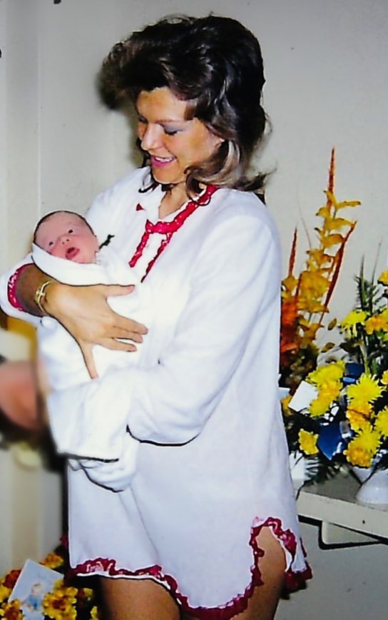 Maye cradles a newborn Elon in 1971