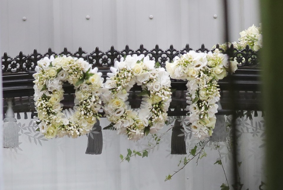 A floral display with Dot’s name on it