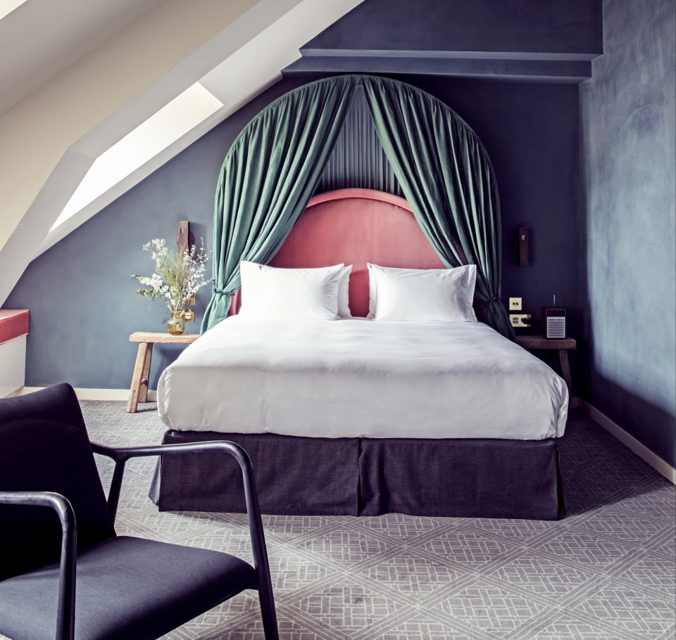 Hôtel des Grands Boulevards boasts canopied beds and rich velvet interiors in muted colours