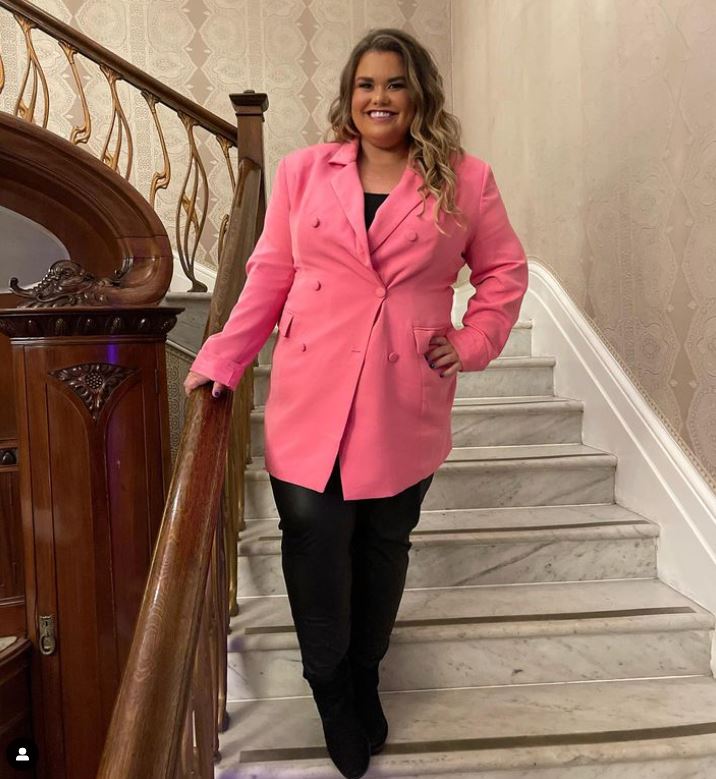 Amy showed off her trim figure in the pink blazer