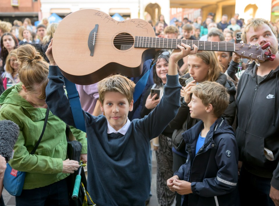 Arthur Baggett, 10, was 'overwhelmed' when Ed said he was going to give him the guitar