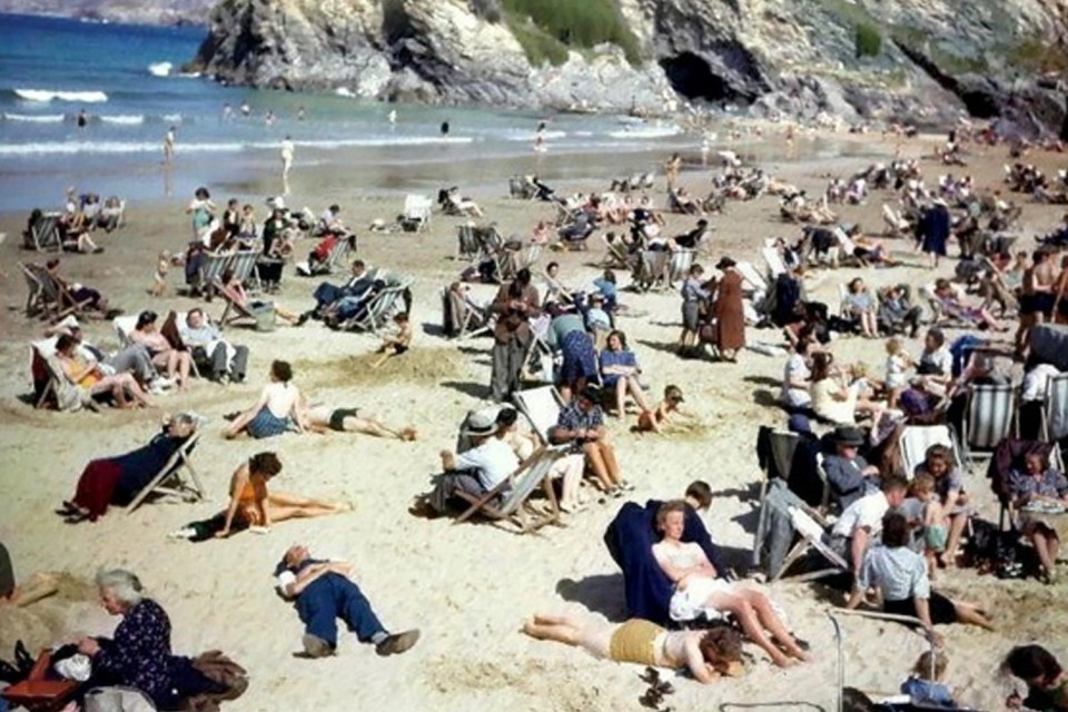 Can you spot the time traveller in this beach snap from the 1940s?