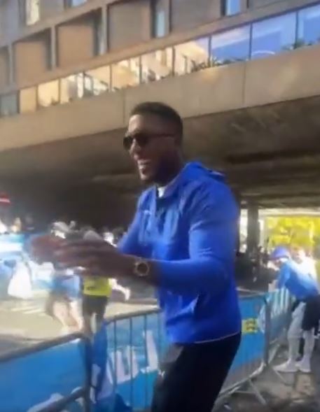 Anthony Joshua had a beaming smile as he stood trackside