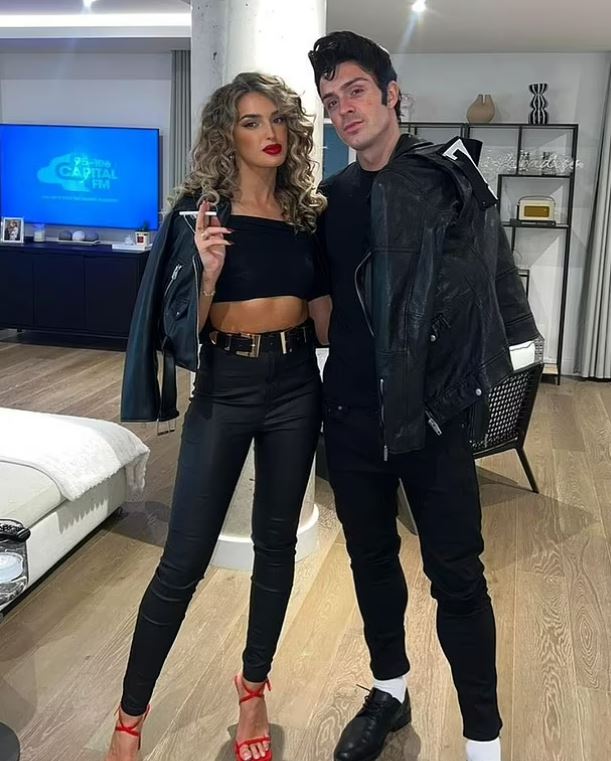 Jack Grealish and Sasha Atwood dressed as Danny and Sandy from Grease