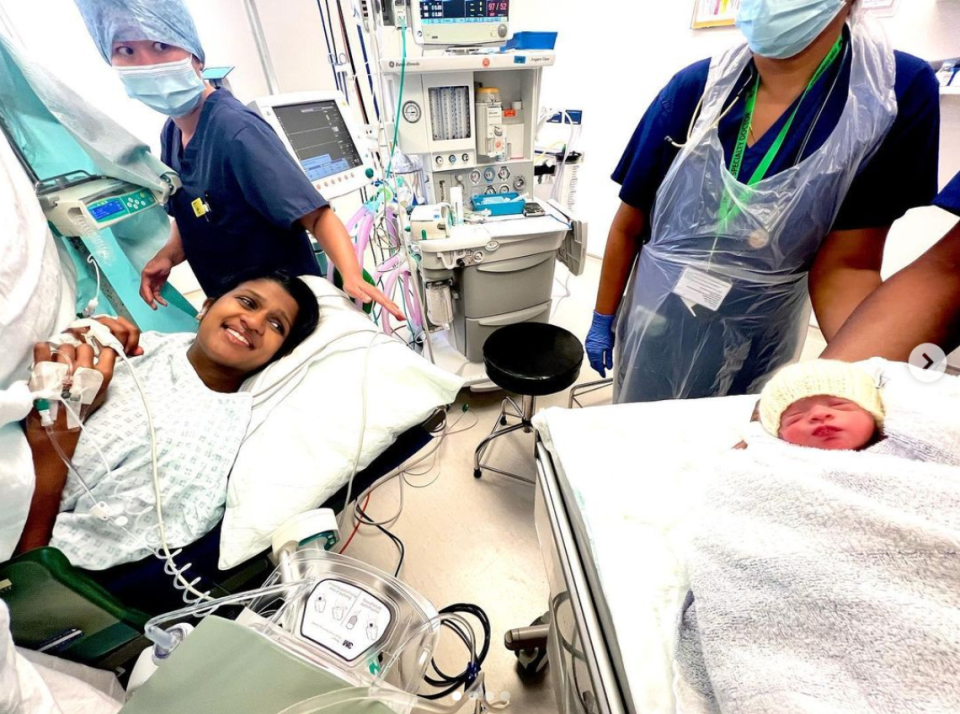 Derrina smiles at her newborn daughter after a 'stressful' labour