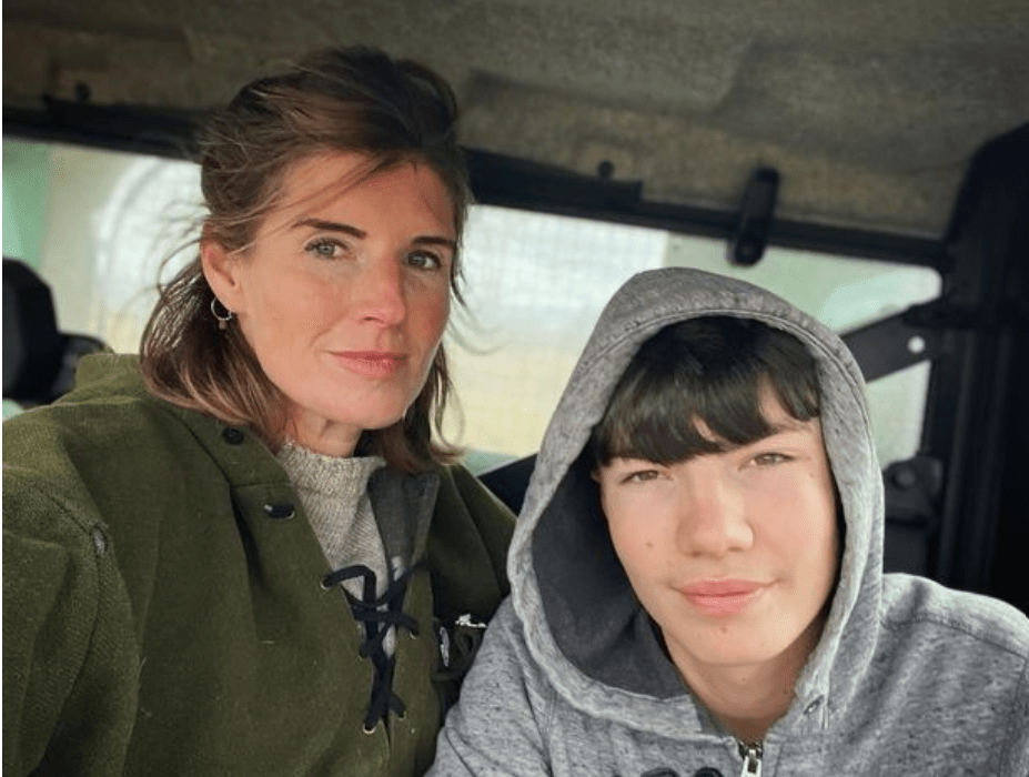 She uploaded this selfie with her eldest son Reuben in her Jeep