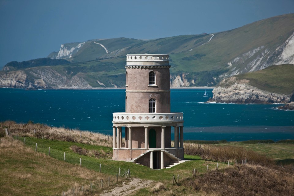 The tower is situated on a cliff and has views of Kimmeridge Bay in Dorset