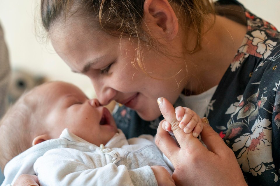 Mum-of-six Anya Lazarska, 30, from Dobropillia with her three-month-old son Bogdan, born in a hospital under shell fire