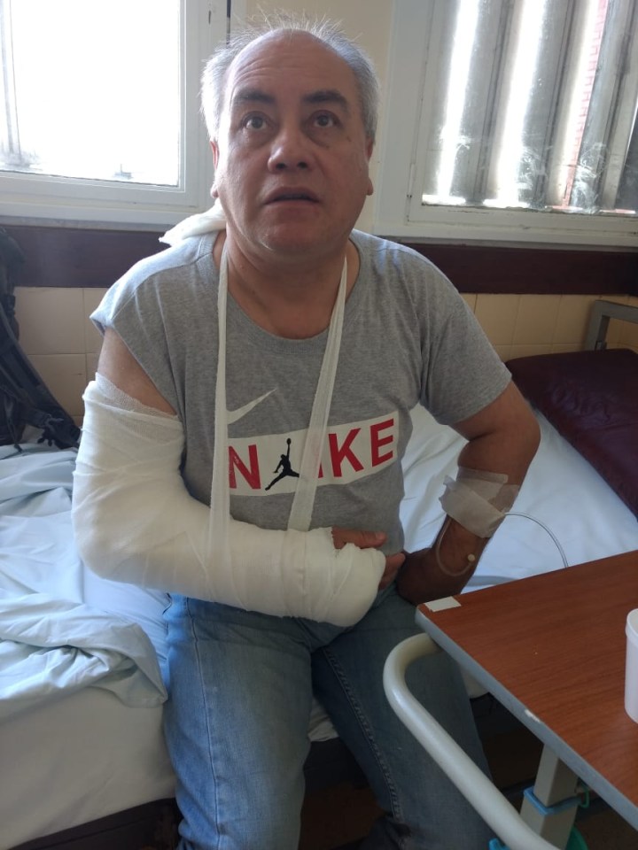 Photographer Pedro Alberto Orquera ended up in hospital with a broken arm.