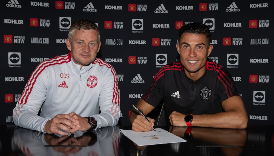 Cristiano Ronaldo was all smiles when he signed for Manchester United again