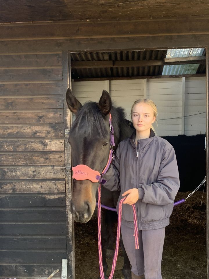 Grace Croft photographed with her horse Bella