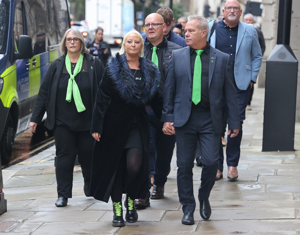 Harry's family pictured arriving at court today