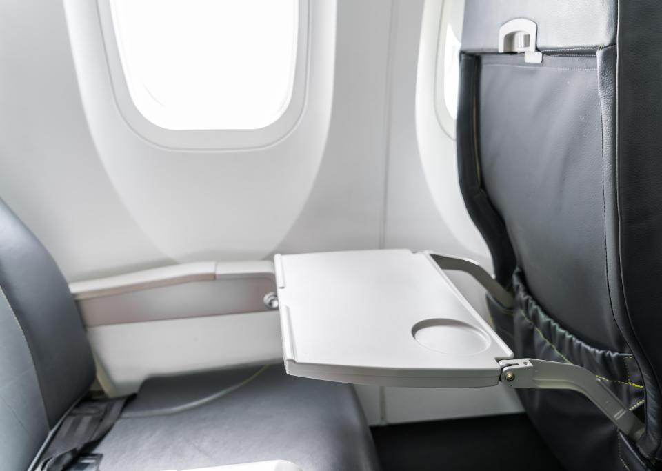 A flight attendant said that tray tables are "gross" and that they wouldn't use them