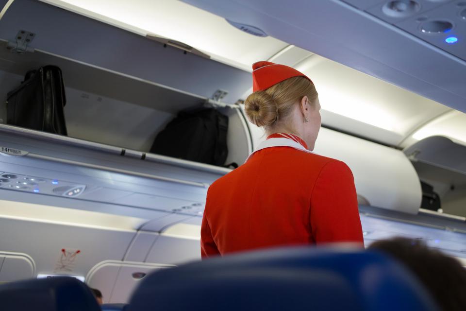 Flight attendants need to be able to walk down the aisle without passengers or luggage in the way