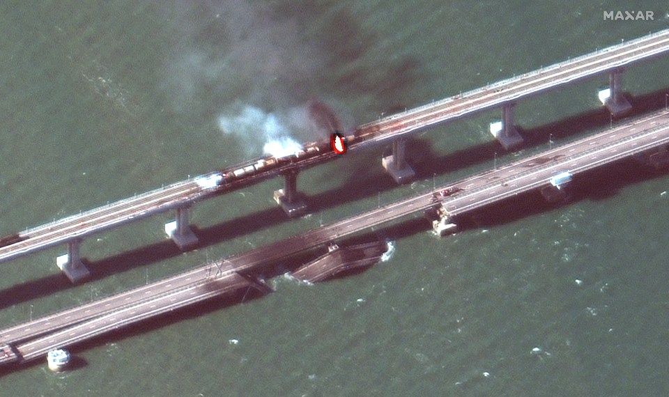 Satellite images show the gaping hole in Putin's prized bridge to Crimea