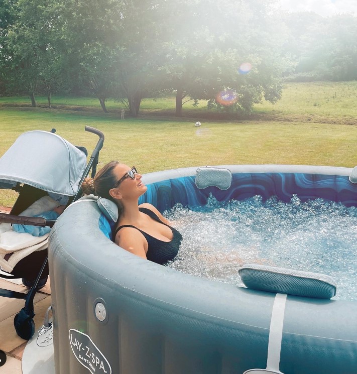 Sam’s garden features a hot tub and a sprawling lawn