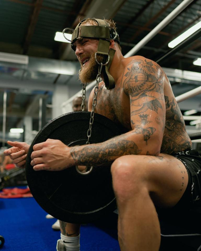 Jake Paul during a neck strengthening exercise