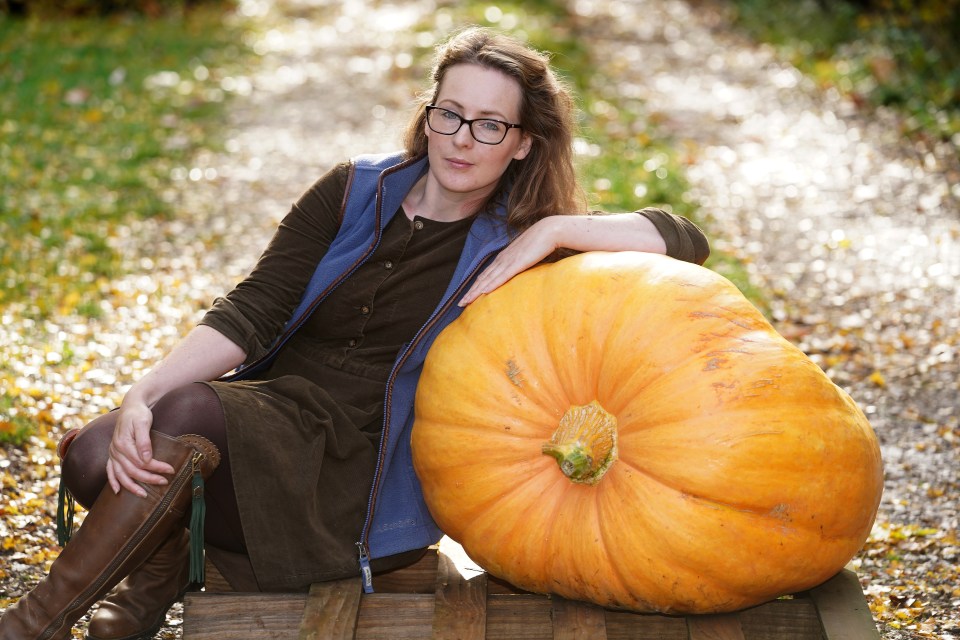 Katie's two foot tall pumpkin is the largest she has grown