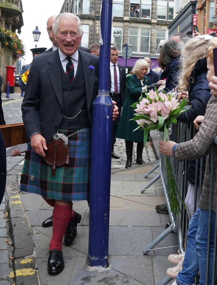 King Charles was the big grin as he visited Scotland in his kilt