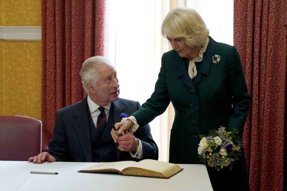 Charles was signing a visitors’ book when he handed the pen to Camilla and said: 'These things are so temperamental'