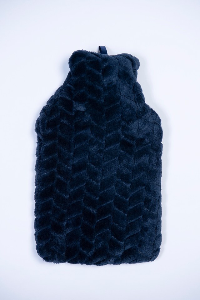 George's Navy Faux Fur hot water bottle is easy to fill with no leaks