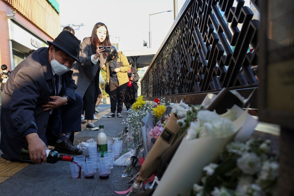 Floral tributes have been left at the scene