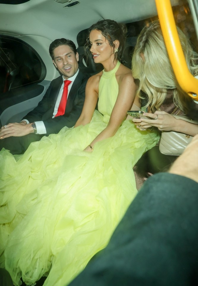 The pair left the event in a taxi together as they smiled and chatted