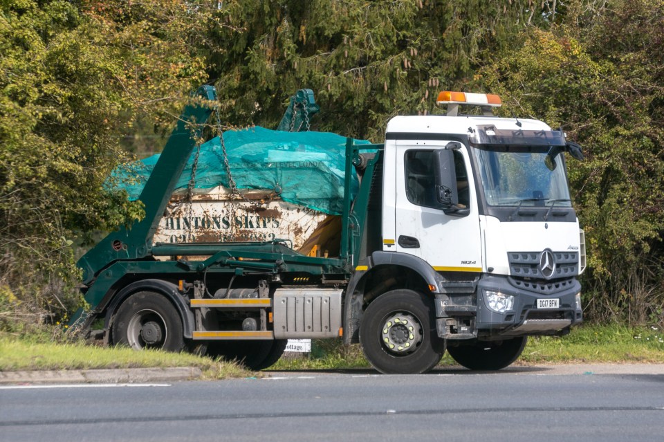 A skip lorry full of rubbish was seen driving away from her home