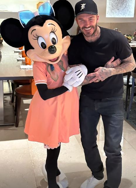 The Beckhams' posed for snaps with Mickey Mouse