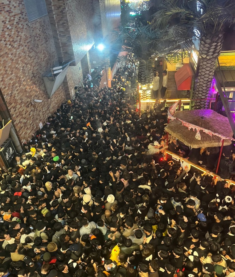 The stampede happened as hundreds of people were forced along a narrow street