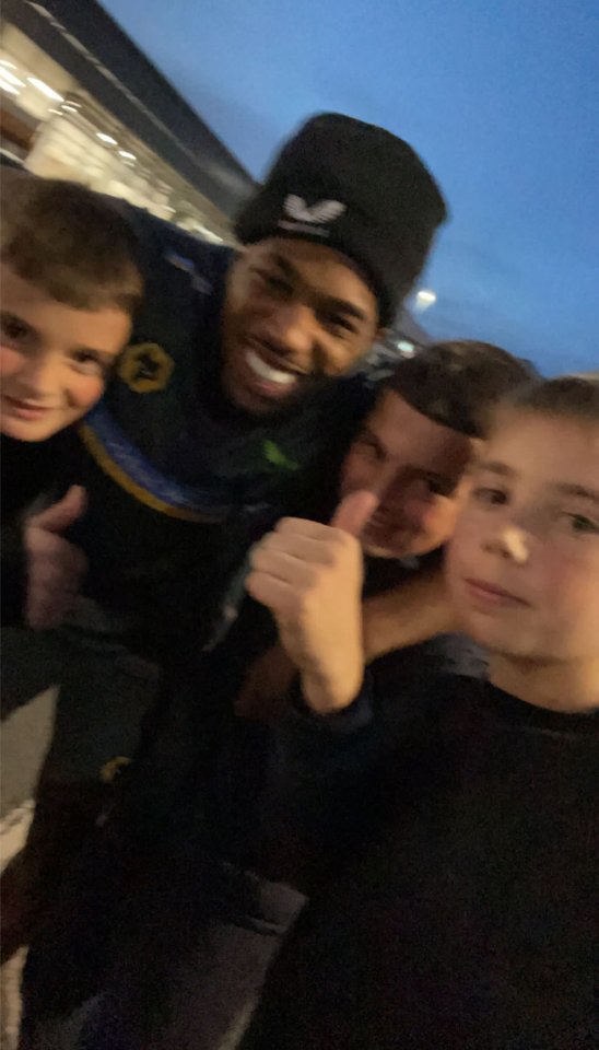 Adama Traore posed for a photo before racing the fans