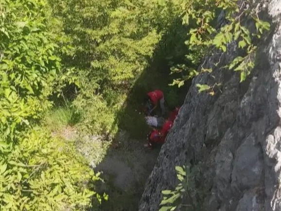 Photo taken from the spot where Mrs Birch-Morgan fell, with medics attending the scene