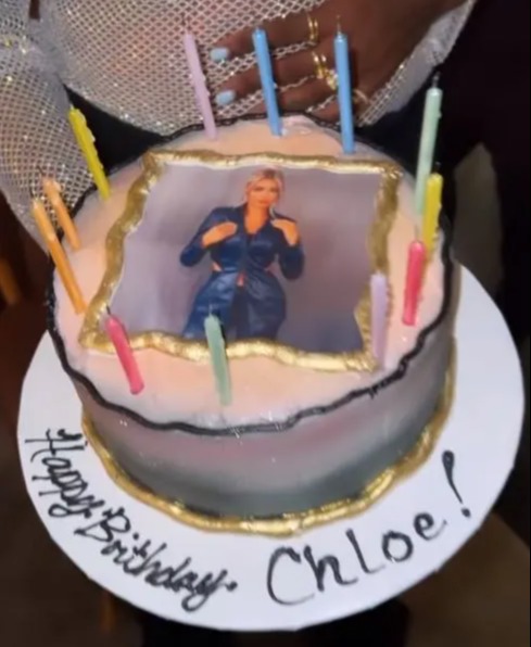 She was presented with a birthday cake topped with a shot of herself