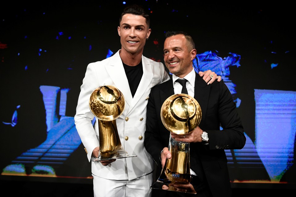 Mendes (right) won the 2022 Globe Soccer Award for Best Agent of the year